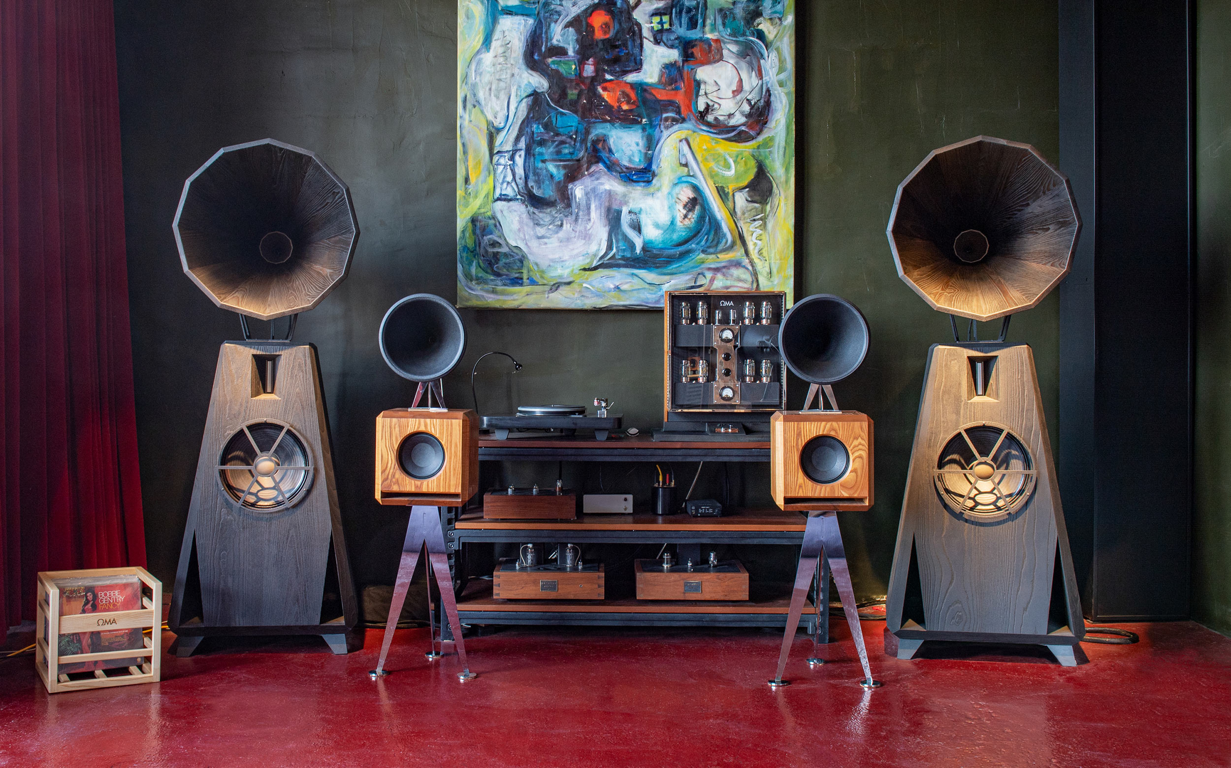 OMA AC1 and Mini loudspeakers in a loft listening space